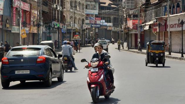 Commuters seen on a road near Lal Chowk in Srinagar, Tuesday, Sept 3, 2019. (PTI) Commuters seen on a road near Lal Chowk in Srinagar, Tuesday, Sept 3, 2019. (PTI)