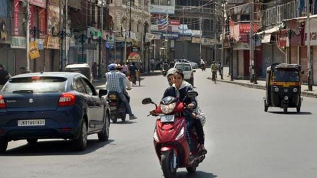 Commuters seen on a road in Kashmir valley after abrogation of the provisions of Article of 370.(PTI photo ( Representational image)) Commuters seen on a road in Kashmir valley after abrogation of the provisions of Article of 370.(PTI photo ( Representational image))