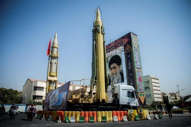 File photo of a display featuring missiles and a portrait of Iran's Supreme Leader Ayatollah Ali Khamenei in Tehran, Iran. State television on Feb 9, 2020, said the elite Revolutionary Guards Corps, in charge of the country’s missile programme, had unveiled a short-range missile.(Reuters File / Photo used for representational purpose only)