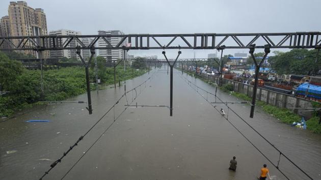 Water logging seen due to heavy rain on railway tracks at Kurla in Mumbai. Due to heavy rains, the tracks on both Central and Western railway lines were submerged forcing the railway authorities to suspend the train operation until water recedes to a safer level. (Satish Bate / HT Photo) Water logging seen due to heavy rain on railway tracks at Kurla in Mumbai. Due to heavy rains, the tracks on both Central and Western railway lines were submerged forcing the railway authorities to suspend the train operation until water recedes to a safer level. (Satish Bate / HT Photo)
