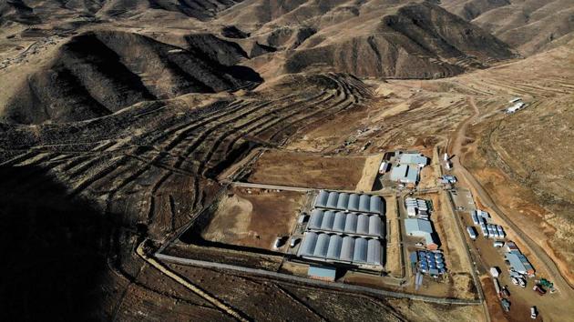 An aerial photograph shows facilities owned by Medigrow. A heliport is also being built to ensure the cannabis -- commonly referred to as “green gold” -- is shipped safely and swiftly, said head of operations Relebohile Liphoto. The investment is spurred by the industry’s positive outlook. The global market for medical cannabis is currently estimated at $150 billion (135 billion euros) and could reach $272 billion in 2028, according to Barclays Bank. (Guillem Sartorio / AFP) An aerial photograph shows facilities owned by Medigrow. A heliport is also being built to ensure the cannabis -- commonly referred to as “green gold” -- is shipped safely and swiftly, said head of operations Relebohile Liphoto. The investment is spurred by the industry’s positive outlook. The global market for medical cannabis is currently estimated at $150 billion (135 billion euros) and could reach $272 billion in 2028, according to Barclays Bank. (Guillem Sartorio / AFP)