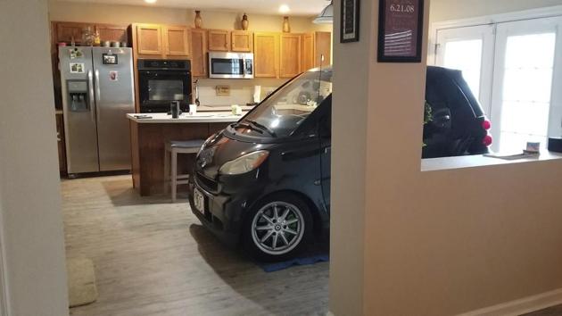 Jessica Eldridge’s husband parked the car in their kitchen. (AP File Photo) Jessica Eldridge’s husband parked the car in their kitchen. (AP File Photo)