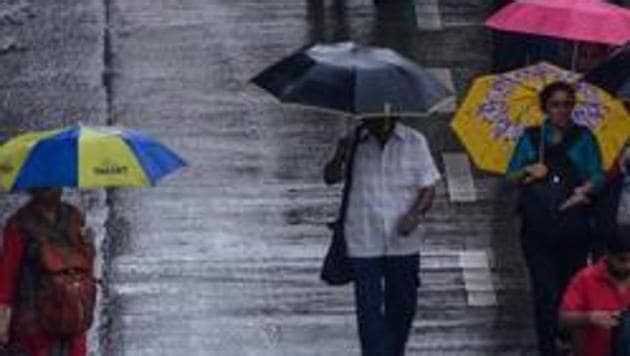 Mumbai, India - Aug. 6, 2019:People deal with rain at Bandra in Mumbai, India, on Tuesday, August 6, 2019. (Photo by Ragul Krishnan/ HT PHOTO) (HT PHOTO) Mumbai, India - Aug. 6, 2019:People deal with rain at Bandra in Mumbai, India, on Tuesday, August 6, 2019. (Photo by Ragul Krishnan/ HT PHOTO) (HT PHOTO)