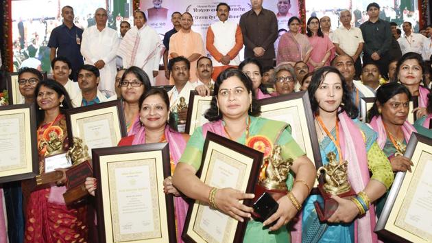 Group Photo , On the Occasion of Teachers Day , Teacher's Honor Ceremony and Prerna App Launched by UP Chief Minister Yogi Adityanath, where Minister Dr Satish Chandra Dwivedi, Minister Mohsin Raza and Minister Gulab Devi ,at IGP, Gomti Nagar Lucknow, Uttar Pradesh, India (Dheeraj Dhawan/Hindustan Times) Group Photo , On the Occasion of Teachers Day , Teacher's Honor Ceremony and Prerna App Launched by UP Chief Minister Yogi Adityanath, where Minister Dr Satish Chandra Dwivedi, Minister Mohsin Raza and Minister Gulab Devi ,at IGP, Gomti Nagar Lucknow, Uttar Pradesh, India (Dheeraj Dhawan/Hindustan Times)