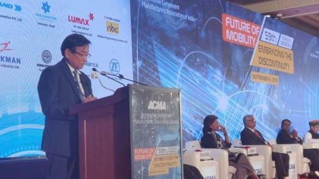 MSI MD and CEO Kenichi Ayukawa asked auto component industry to produce key parts to cut import costs. (@ACMAIndia/Twitter) MSI MD and CEO Kenichi Ayukawa asked auto component industry to produce key parts to cut import costs. (@ACMAIndia/Twitter)
