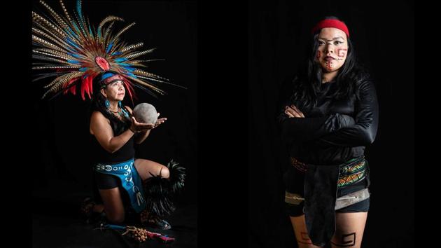 Elena Garcia (L), a pre-game ceremonial and dancer representing “Aquetzalli Tlayotzin” (precious water heart of the earth) and Beatriz Campos(R), an ulama player during a photo session at the FARO Poniente cultural center. “We’re women-warriors at heart, because it isn’t easy. Not just anyone can play this sport. It takes a lot of practice, and your body takes a beating,” said Campos, 25. (Omar Torres / AFP) 