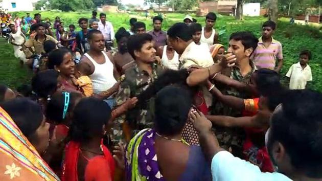 An August 27 photo of a woman being beaten up over allegations of child lifting in Jharkhand’s Giridih. There have been several incidents in the past few months in north India where people have been thrashed over allegations of child lifting. (HT file photo) An August 27 photo of a woman being beaten up over allegations of child lifting in Jharkhand’s Giridih. There have been several incidents in the past few months in north India where people have been thrashed over allegations of child lifting. (HT file photo)