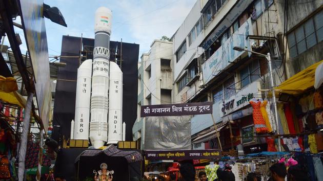 Devotees at a Ganesh 'Mandap' created on the theme of Chandrayaan-2 launch during Ganpati festival in Pune.(Photo: PTI)