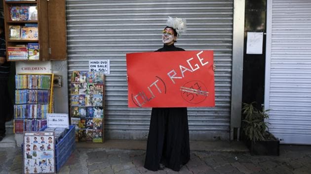 A gay rights activist holds a banner during a protest against the verdict by the Supreme Court in Mumbai. Global Day of Rage demonstrations were organized in over 30 cities worldwide to protest Section 377. The individuals violating the law could be punished for up to 10 years in prison. (Danish Siddiqui / REUTERS File)