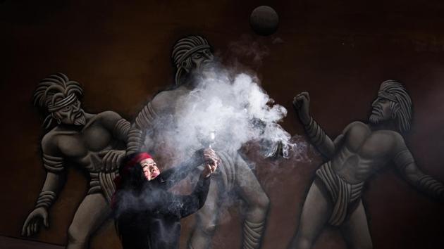 Beatriz Campos performs the “Copal” ceremony ahead of a match. “The game and its religious connotations changed over time… When the Spanish arrived, because of the political and religious aspects of the ballgame, it was probably one of the first things they banned,” said Annick Daneels, an expert on pre-Columbian ballgames at Mexico’s UNAM university. (Omar Torres / AFP) Beatriz Campos performs the “Copal” ceremony ahead of a match. “The game and its religious connotations changed over time… When the Spanish arrived, because of the political and religious aspects of the ballgame, it was probably one of the first things they banned,” said Annick Daneels, an expert on pre-Columbian ballgames at Mexico’s UNAM university. (Omar Torres / AFP)