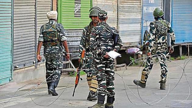 Paramilitary forces during a lockdown in Srinagar on Friday.(AP image)