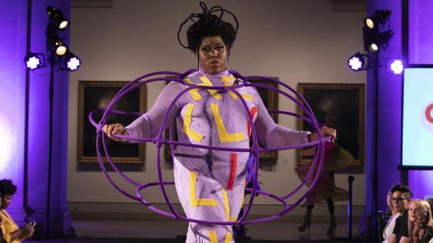 The Claire Fleury collection is modeled during the dapperQ fashion show at the Brooklyn Museum on Thursday, Sept. 5, 2019, in New York. (AP Photo/Jeenah Moon)(AP)