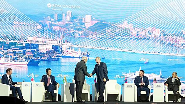 Prime Minister Narendra Modi shakes hand with Russian President Vladimir Putin at the plenary session of 5th Eastern Economic Forum (EEF), in Vladivostok, Russia. (ANI) Prime Minister Narendra Modi shakes hand with Russian President Vladimir Putin at the plenary session of 5th Eastern Economic Forum (EEF), in Vladivostok, Russia. (ANI)