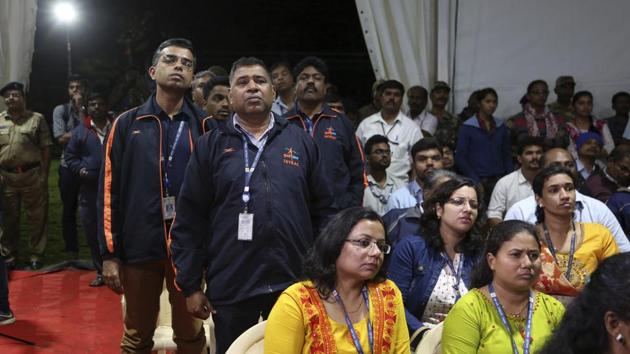 Indian Space Research Organization (ISRO) employees react as they listen to an announcement by organizations's chief Kailasavadivoo Sivan at its Telemetry, Tracking and Command Network facility in Bengaluru on Saturday. Isro lost touch with its Vikram lunar lander as it aimed to land on the south pole of the moon and deploy a rover to search for signs of water.(AP Photo)