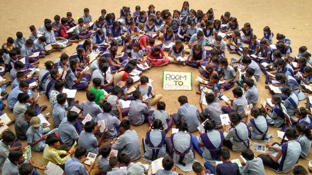 School students from government schools across 9 states participate in a Read-A-Thon on the eve of Literacy day, at Kulsumpura, in Hyderabad, Telangana. (PTI) School students from government schools across 9 states participate in a Read-A-Thon on the eve of Literacy day, at Kulsumpura, in Hyderabad, Telangana. (PTI)