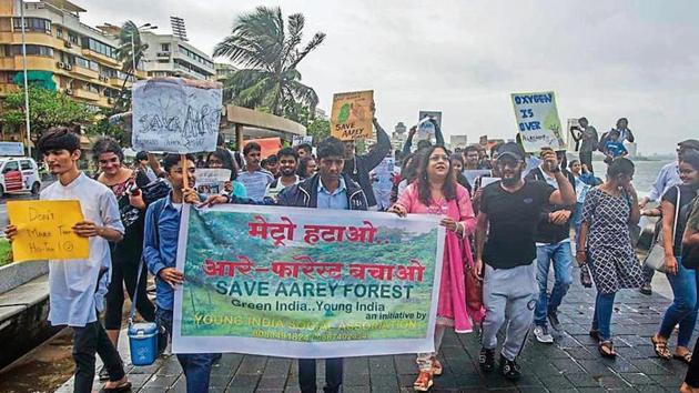 Citizens held a protest march against the cutting of trees in Aarey Milk Colony for the Metro-3 project, at Marine Drive, on Saturday. (Pratik Chorge/HT Photo) Citizens held a protest march against the cutting of trees in Aarey Milk Colony for the Metro-3 project, at Marine Drive, on Saturday. (Pratik Chorge/HT Photo)