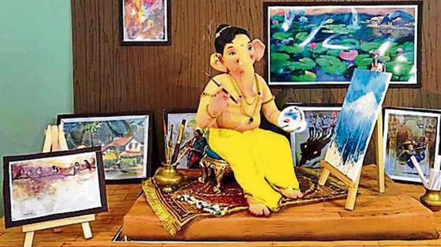 The idol made by Amit Sonawane; (below) the clay idol made by an 18-year-old.(praful gangurde/ht photo) The idol made by Amit Sonawane; (below) the clay idol made by an 18-year-old.(praful gangurde/ht photo)