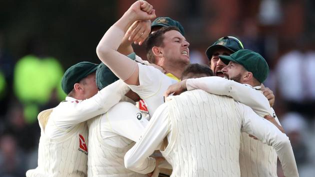 Australia's Josh Hazlewood celebrates taking the wicket of England's Craig Overton.(Action Images via Reuters)