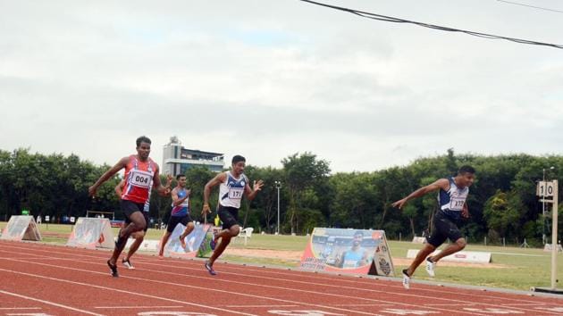 Mohammed Ajmal on the right corner in action during the 200m race at Army Sports in Pune, India, on Saturday.(Shankar Narayan/HT PHOTO)