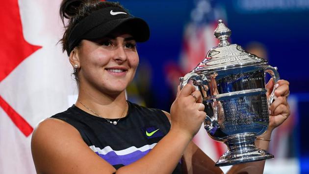 Bianca Andreescu of Canada poses with the championship trophy after defeating Serena Williams of the United States(USA TODAY Sports)