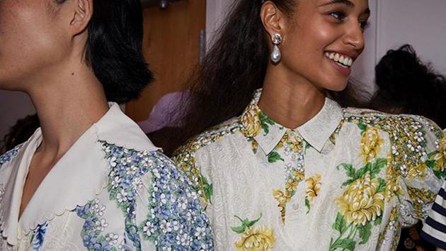 American designer Tory Burch, a paragon of Bohemian chic style, wowed a star-studded audience with soft floral prints and baggy, puffed-out sleeves that had a distinct 1980s feel.(Tory Burch/Instagram)