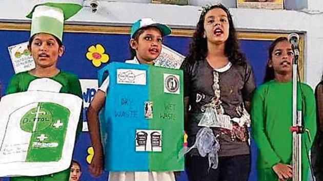 Students presenting a group song.(HT) Students presenting a group song.(HT)