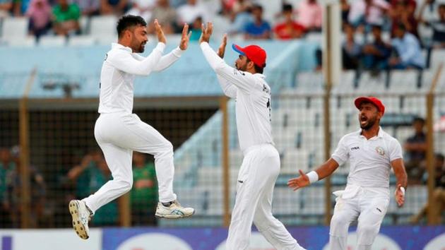 Afghanistan captain Rashid Khan celebrates after picking up a wicket against Bangladesh in the one off Test at Chattogram.(Twitter/ICC) Afghanistan captain Rashid Khan celebrates after picking up a wicket against Bangladesh in the one off Test at Chattogram.(Twitter/ICC)