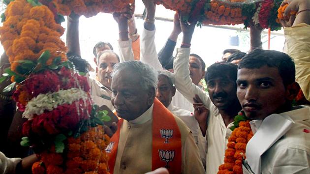 Former Rajasthan Governor Kalyan Singh being garlanded by party workers as he joined BJP in the presence of State President Swantra Dev Singh, at the party office in Lucknow on Monday. (ANI Photo)