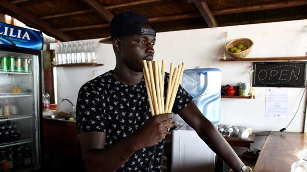 Copacabana restaurant owner Babacar Thiaw holds bamboo straws at the restaurant on the Yoff Virage beach in Dakar, Senagal. Babacar Thiaw took the initiative of opening Dakar’s first “zero plastic” restaurant in a response to the rubbish strewn along the beaches of the Senegalese capital. (Seyllou / AFP)