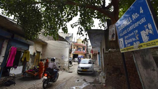 An entrance to village Carterpuri, in old Gurugram. The 39th President of the United States Jimmy Carter visited this village, which was then called Daulatpur Nashirabad, in January 1978. The story goes that Carter’s mother, Bessie Lillian, had worked and lived here as a nurse during the Second World War. After his visit, the village was rechristened Carterpuri in his honour. (Sanjeev Verma / HT Photo)