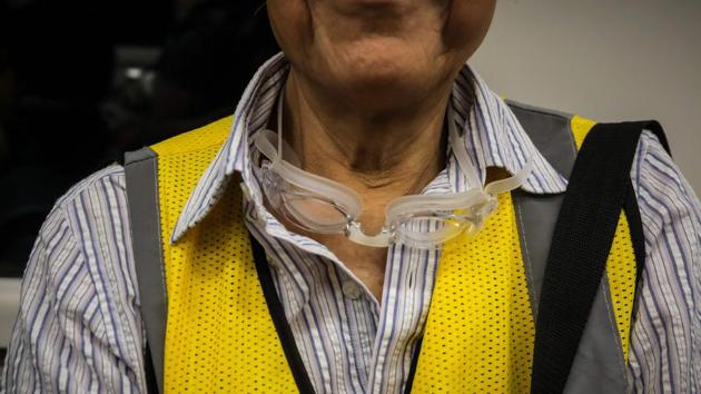 A pair of swimming goggles dangle from Grandpa Wong’s neck. Roy Chan, who organises the “Protect the Children” group, says he respects what the elderly citizens do but is disappointed they feel they need to come out. “They should have a good life at home during the last years of their lives,” he said. “But they are in a war and protecting the youth.” (Vivek Prakash / AFP) A pair of swimming goggles dangle from Grandpa Wong’s neck. Roy Chan, who organises the “Protect the Children” group, says he respects what the elderly citizens do but is disappointed they feel they need to come out. “They should have a good life at home during the last years of their lives,” he said. “But they are in a war and protecting the youth.” (Vivek Prakash / AFP)