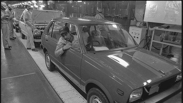 Cars under production at the Maruti plant in December 1983, the year of its opening. “All of us would have remained peasants if there was no Maruti factory here,” said Malkhan Singh, who retired from Maruti Suzuki this year after almost four decades of service. Carterpuri, once a village of around 800 farmers, today has a population of about 12,000. About 10,000 are migrant workers, a majority working in Maruti and auto ancillary units. (Virendra Prabhakar / HT Archive)