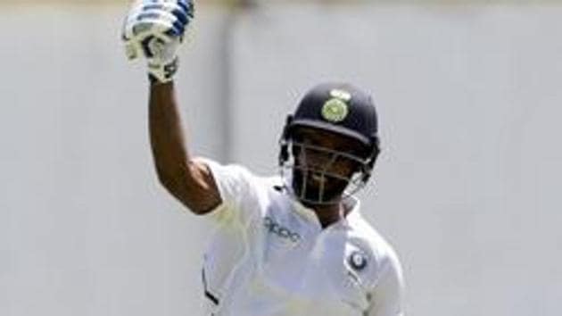 India's Hanuma Vihari celebrates after he scored a century against West Indies during day two of the second Test cricket match at Sabina Park cricket ground in Kingston, Jamaica. (AP) India's Hanuma Vihari celebrates after he scored a century against West Indies during day two of the second Test cricket match at Sabina Park cricket ground in Kingston, Jamaica. (AP)
