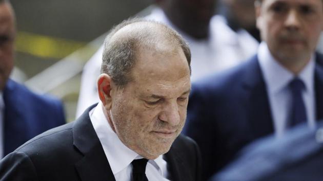 Harvey Weinstein arrives in court in New York. A new book by The New York Times reporters who uncovered sexual misconduct accusations against Weinstein includes new details on the movie mogul’s attempts to stop the newspaper from publishing the story.(AP)