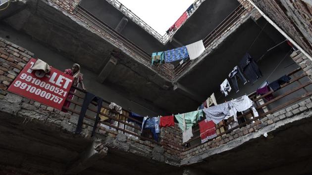 As migrants flocked to Carterpuri in the late 1980s and the early 1990s, Carterpuri became a preferred housing destination., transforming from a farming village into a workers’ colony. But these days, a lot of rooms are empty. The villagers, many of whom earned as much as ₹5 lakh a month as rental income until a few months ago, blame it on the slump in the auto sector. (Sanjeev Verma / HT Photo)
