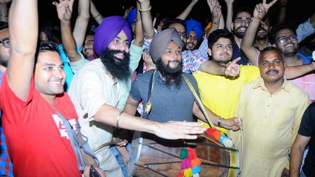 Members of NSUI celebrating after their candidate emerged winner following recounting.(Anil Dayal/HT)