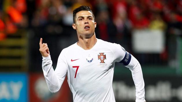 Euro 2020 Qualifier - Group B - Lithuania v Portugal - LFF Stadium, Vilnius, Lithuania - September 10, 2019 Portugal's Cristiano Ronaldo celebrates scoring their first goal from the penalty spot(REUTERS)