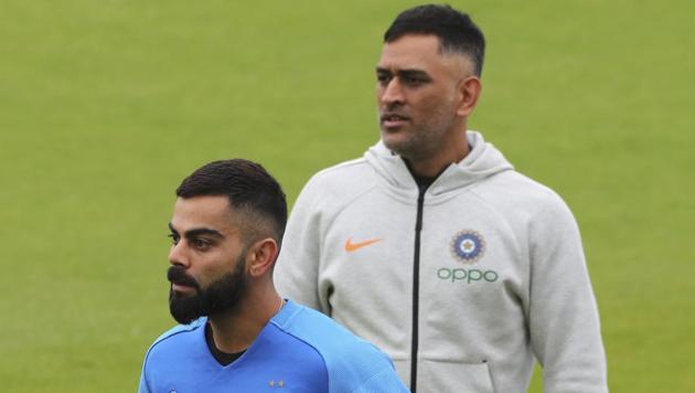 India's captain Virat Kohli, left, and MS Dhoni during a training session(AP)