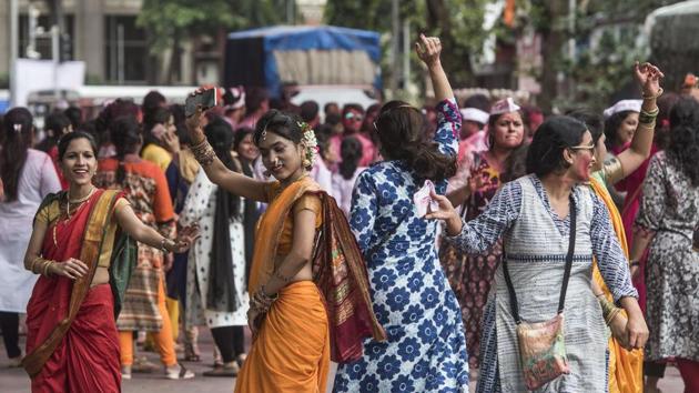 Revellers dance during a visarjan procession in Mumbai. The festival is synonymous with the sounds of ‘Ganpati Bappa Morya’ chanted by devotees in processions throughout the 10-day period, calling the deity back to their homes as soon as possible next year. (Satyabrata Tripathy / Ht Photo) 