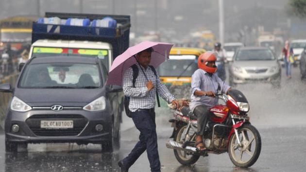 People move during light rain, at National Highway 48, Sector 30, in Gurugram, India, on Thursday, September 12, 2019. (Photo by Yogendra Kumar / Hindustan Times) (Yogendra Kumar/HT PHOTO) People move during light rain, at National Highway 48, Sector 30, in Gurugram, India, on Thursday, September 12, 2019. (Photo by Yogendra Kumar / Hindustan Times) (Yogendra Kumar/HT PHOTO)
