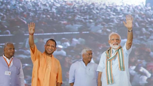 Prime Minister Narendra Modi and Uttar Pradesh Chief Minister Yogi Adityanath wave at their supporters during launch of National Animal Disease Control Programme for eradication of Foot and Mouth Disease and Brucellosis in livestock, in Mathura, Wednesday, Sept. 11, 2019. (PTI) Prime Minister Narendra Modi and Uttar Pradesh Chief Minister Yogi Adityanath wave at their supporters during launch of National Animal Disease Control Programme for eradication of Foot and Mouth Disease and Brucellosis in livestock, in Mathura, Wednesday, Sept. 11, 2019. (PTI)