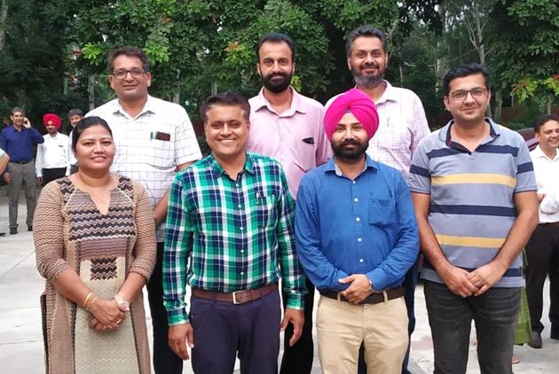 (Clockwise from top-left) Newly-elected PUTA members secretary Gurnam Virk, president Jaswinder Singh Brar, executive members Avneet Pal Singh, Ashok Bathla, Sikander Singh Cheema, Harish Kumar and joint secretary-cum-treasurer Poonam Patyar at Punjabi University in Patiala on Friday.(HT PHOTO)