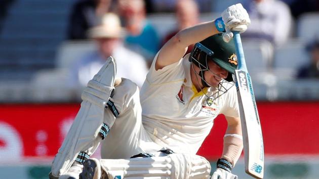 Australia's Steve Smith falls down.(Reuters)