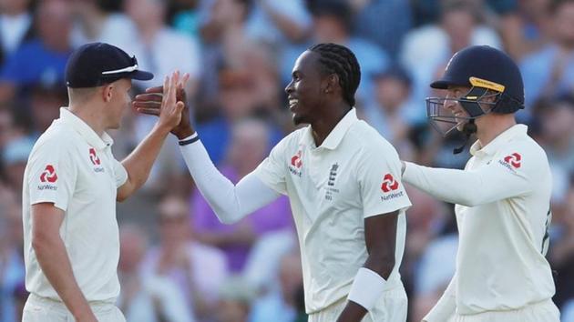 England's Jofra Archer celebrates with teammates.(Reuters)