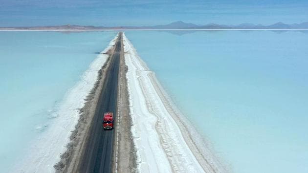 A truck on a road crosses the flooded southern zone of the Uyuni Salt Flat, Bolivia. (Pablo Cozzaglio / AFP) A truck on a road crosses the flooded southern zone of the Uyuni Salt Flat, Bolivia. (Pablo Cozzaglio / AFP)