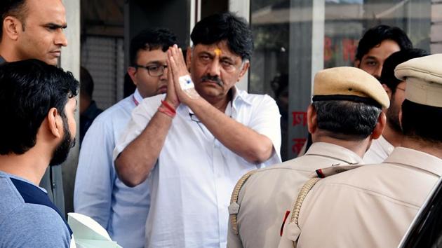 Karnataka Congress leader DK Shivakumar outside ED office while going to Rouse Avenue Court in New Delhi on Friday. (ANI Photo)