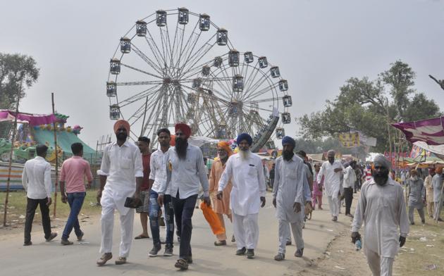 Visitors on the first day of Chappar Mela in Ludhiana on Friday.(Gurminder Singh/HT)