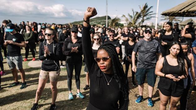 A woman raises her fist in a march against gender based violence and in solidarity with women who have been subject to violence and in memory of those who have been killed, at the North Beach in Durban, South Africa. The Crime Against Women in South Africa Report released by Statistics South Africa (SA) shows that femicide is 5 times higher than the global average. (Rajesh Jantilal / AFP) A woman raises her fist in a march against gender based violence and in solidarity with women who have been subject to violence and in memory of those who have been killed, at the North Beach in Durban, South Africa. The Crime Against Women in South Africa Report released by Statistics South Africa (SA) shows that femicide is 5 times higher than the global average. (Rajesh Jantilal / AFP)