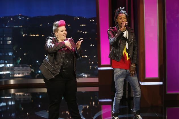 Amber Galloway Gallego sings alongside musician Wiz Khalifa, keeping pace with his lyrics and mood. Amber Galloway Gallego sings alongside musician Wiz Khalifa, keeping pace with his lyrics and mood.