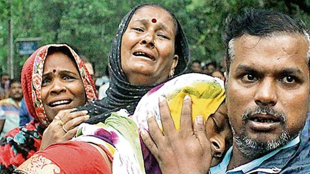 Family members of a deceased grieve after a boat capsized in the Lower Lake in Bhopal on Friday (ANI) Family members of a deceased grieve after a boat capsized in the Lower Lake in Bhopal on Friday (ANI)